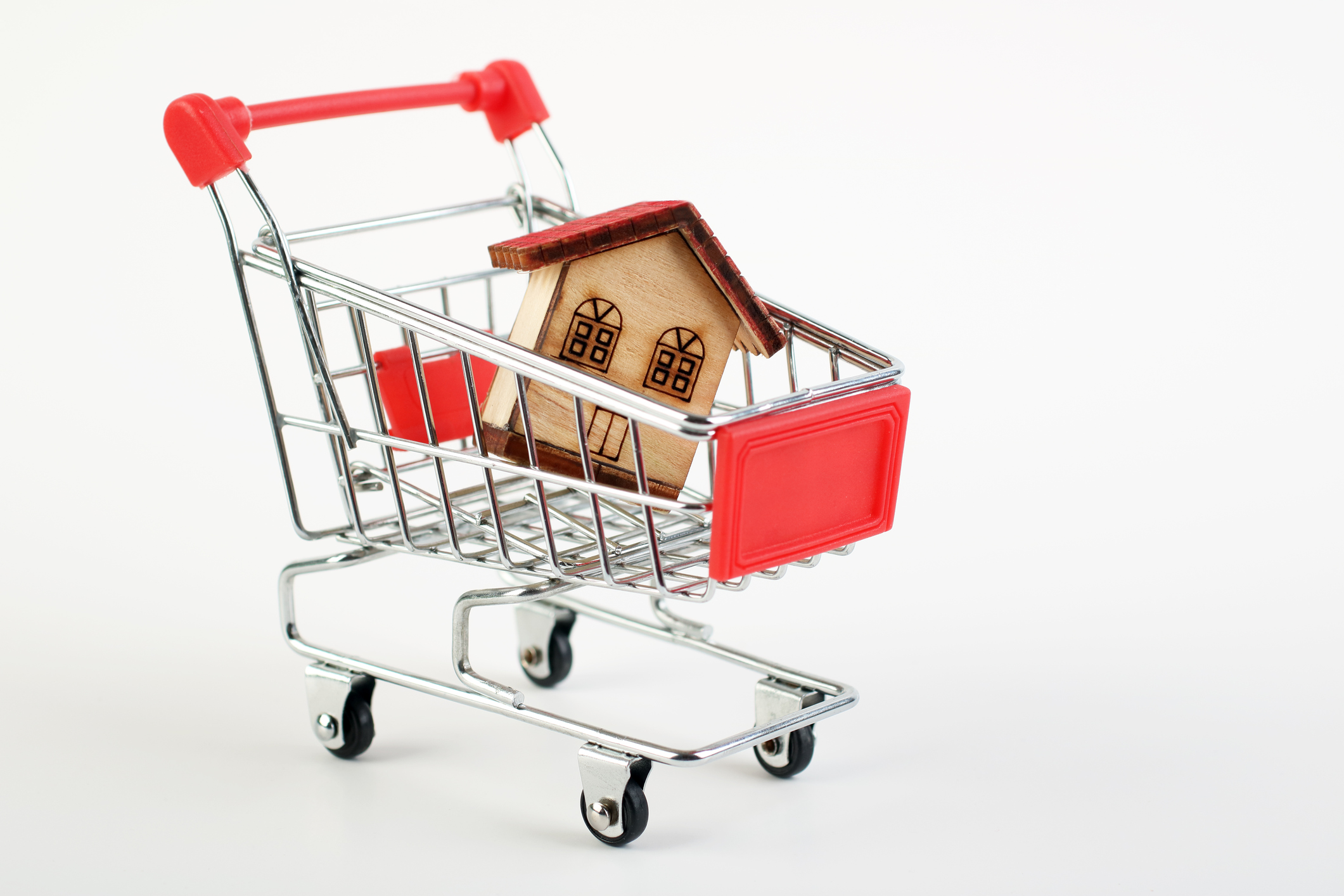 Caddie transportant une maison